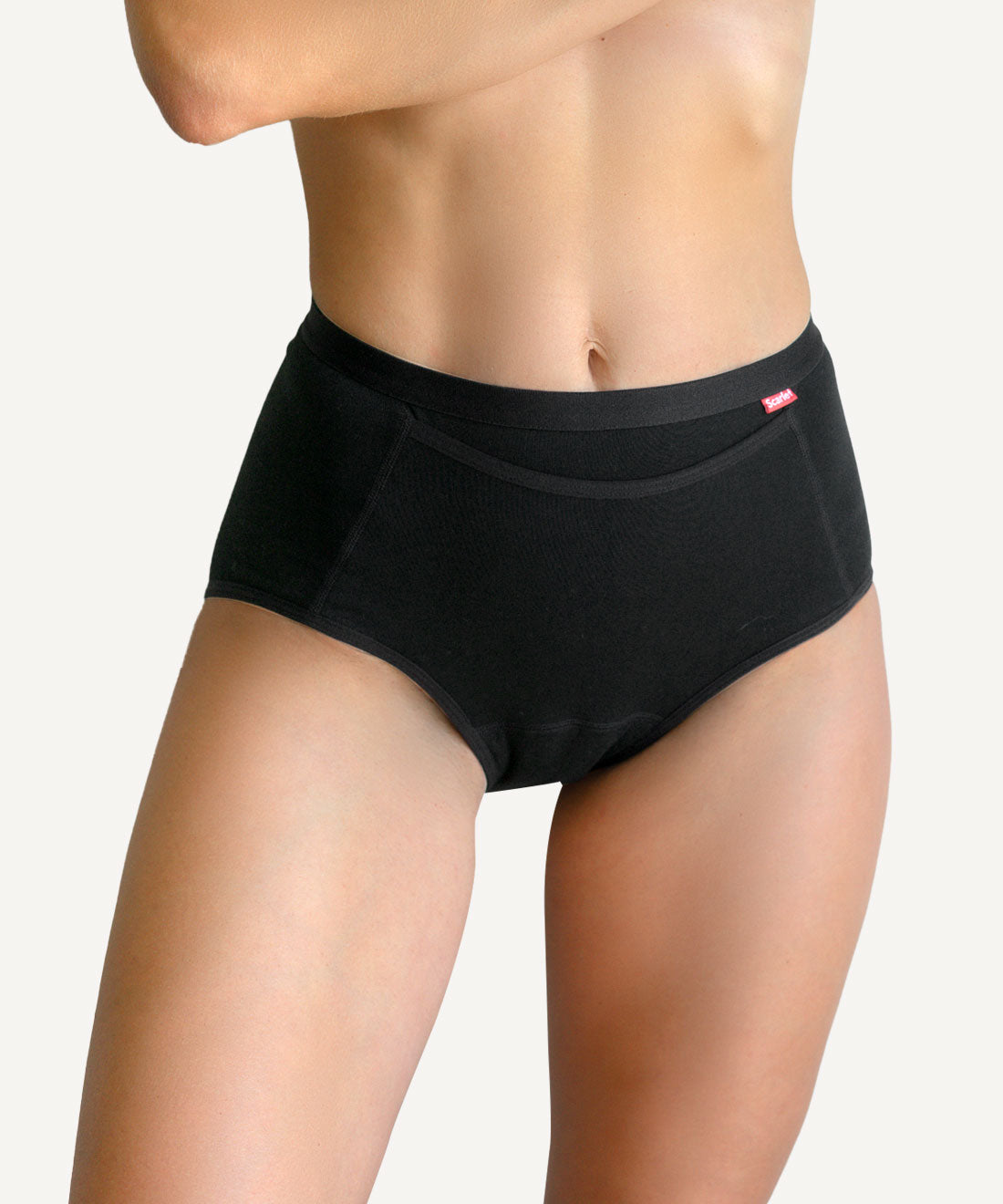 Scarlet Period Pocket Underwear are designed with a discreet pocket to securely carry your rae heat device so you can access pain relief on the go.