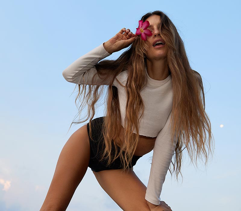 Girl looking happy with blue sky background
