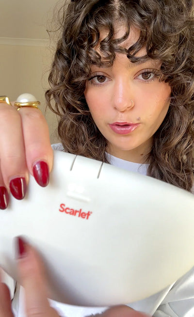 Influencer @alyssa.forato with her Scarlet Period rae Heat Pad
