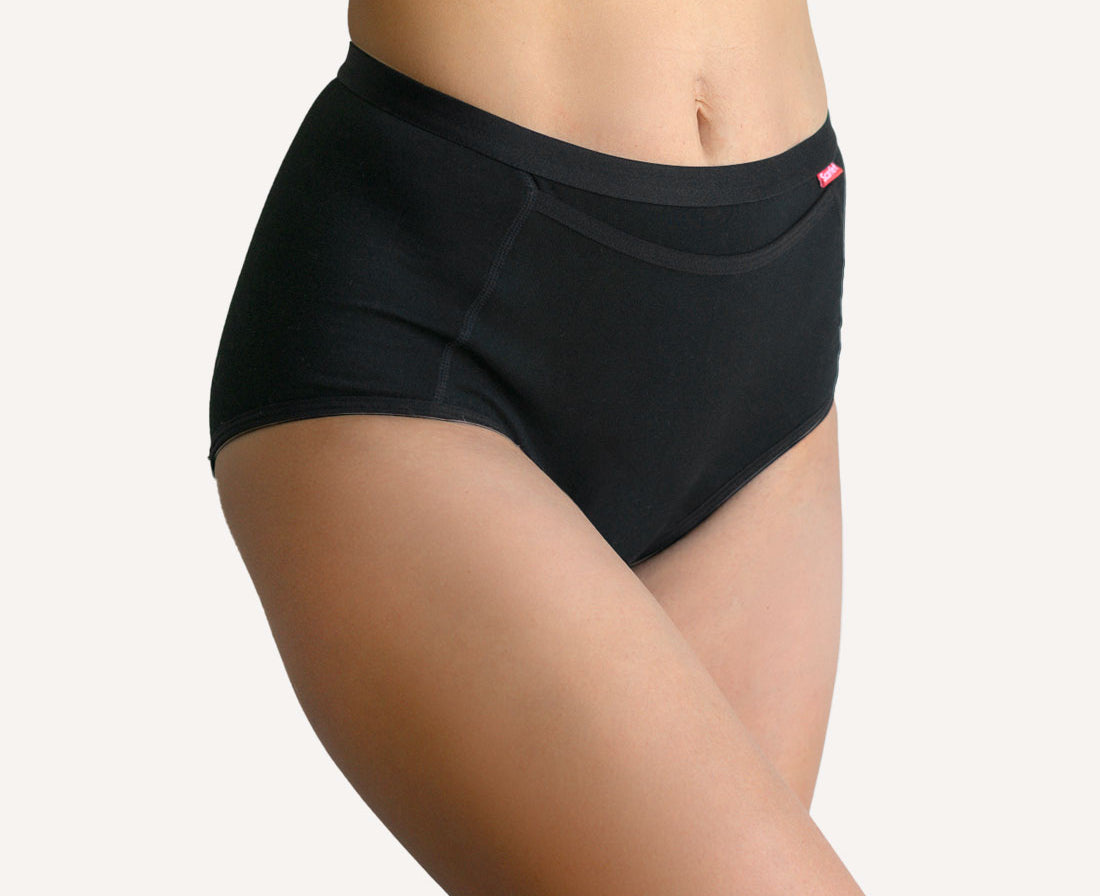 Scarlet Everyday Pocket Brief worn, high-waist 95% organic cotton brief with a built-in heat pad pocket